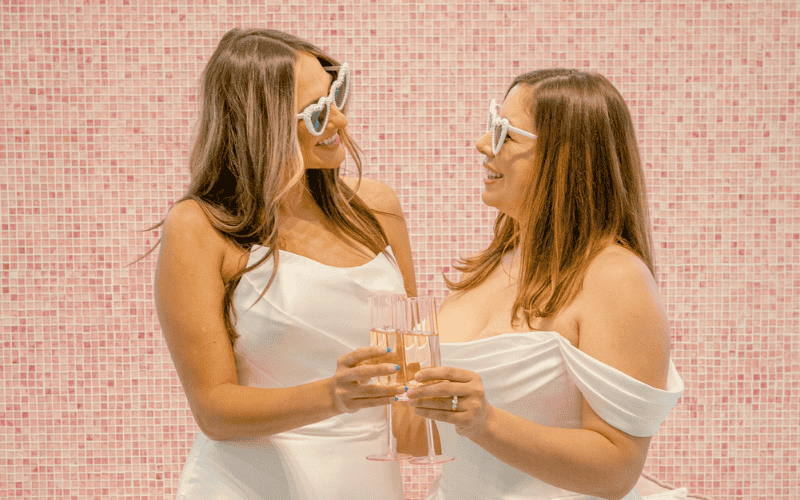 Brides in White Wedding Dresses with Heart-Shaped Sunglasses