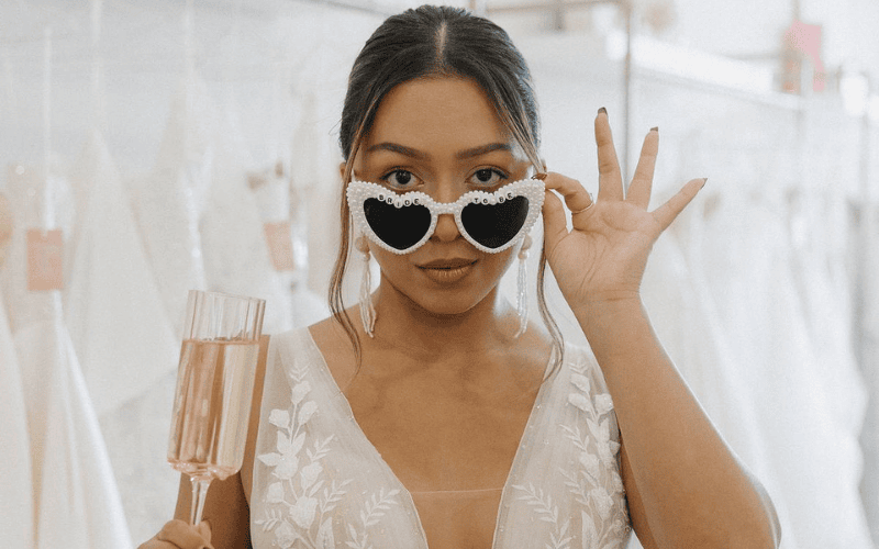 a bride wearing fancy sunglasses