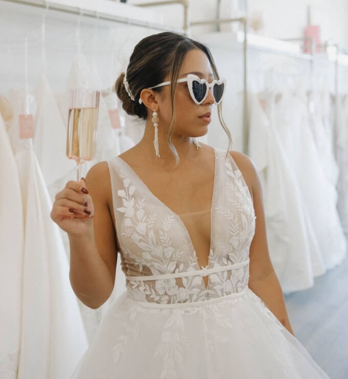 Model wearing a white bridal dress