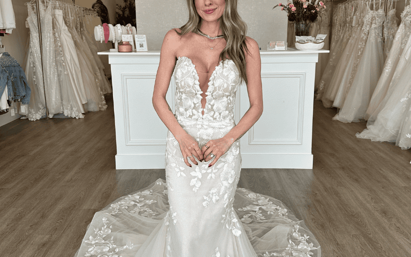 bride at babe bridal boutique wearing fit and flare wedding dress