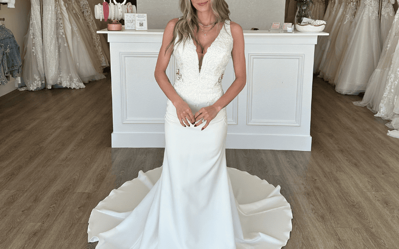bride at babe bridal boutique wearing sheath wedding dress