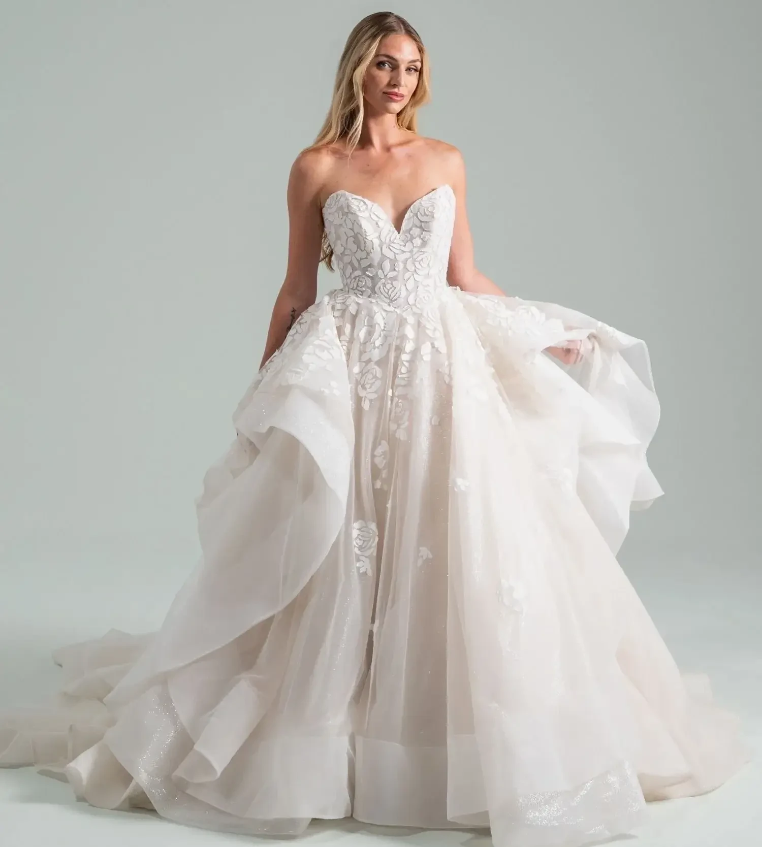 Model wearing a Hailey Paige gown