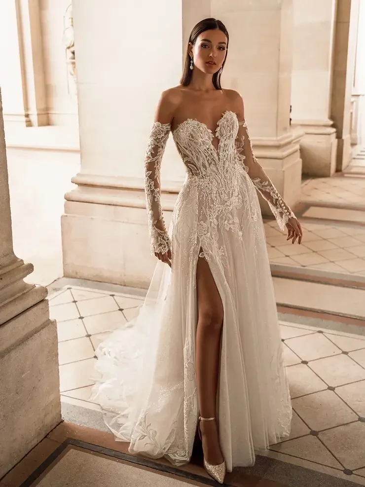 Lace Off-the-Shoulder Wedding Dress with Long Sleeves and Slit at Babe Bridal Boutique